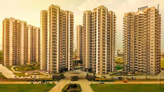 Adani Oyster Grande - towers at golden hour (real photo) thumbnail