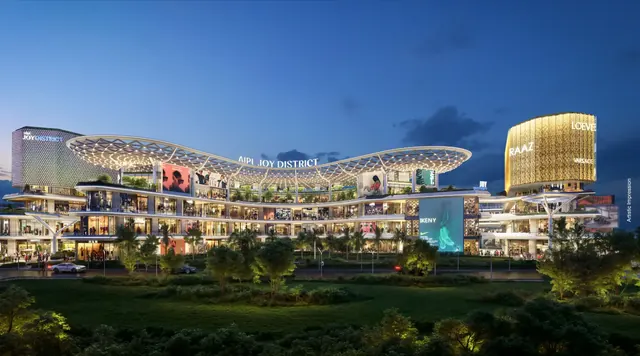 AIPL Joy District - front elevation at dusk, wide thumbnail