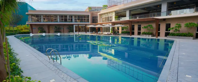 Ashiana Amarah - swimming pool (real photo) thumbnail