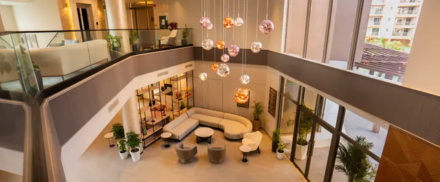 Ashiana Amarah - clubhouse lounge interior (real photo) thumbnail