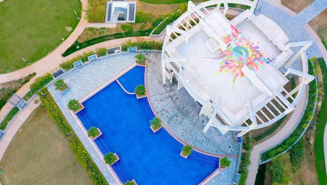Bestech Park View Sanskriti - aerial of clubhouse and pool thumbnail