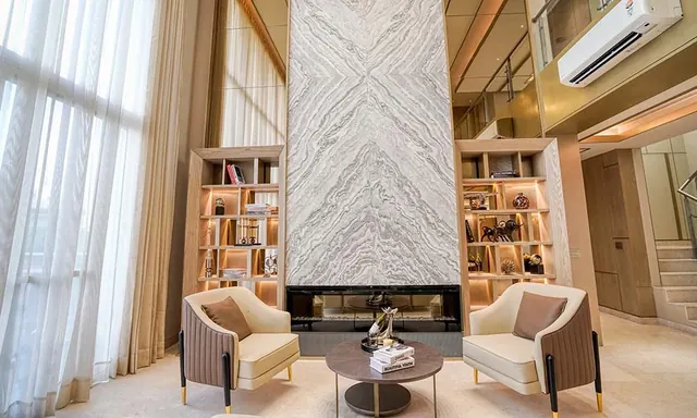 Experion Windchants - living area with fireplace wall (photo) thumbnail