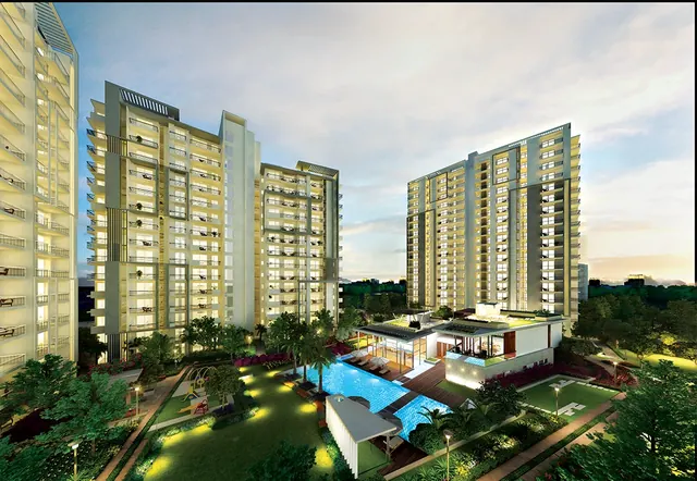 Godrej Oasis - towers and clubhouse at dusk thumbnail