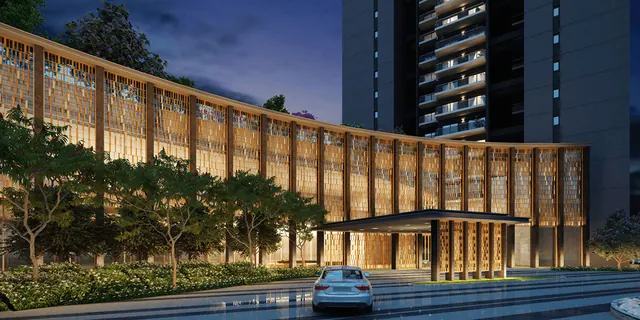 Krisumi Waterfall Residences - clubhouse drop-off and tower at dusk thumbnail