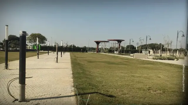 M3M Xpressway 114 - Actual image of internal walkways and landscaping thumbnail